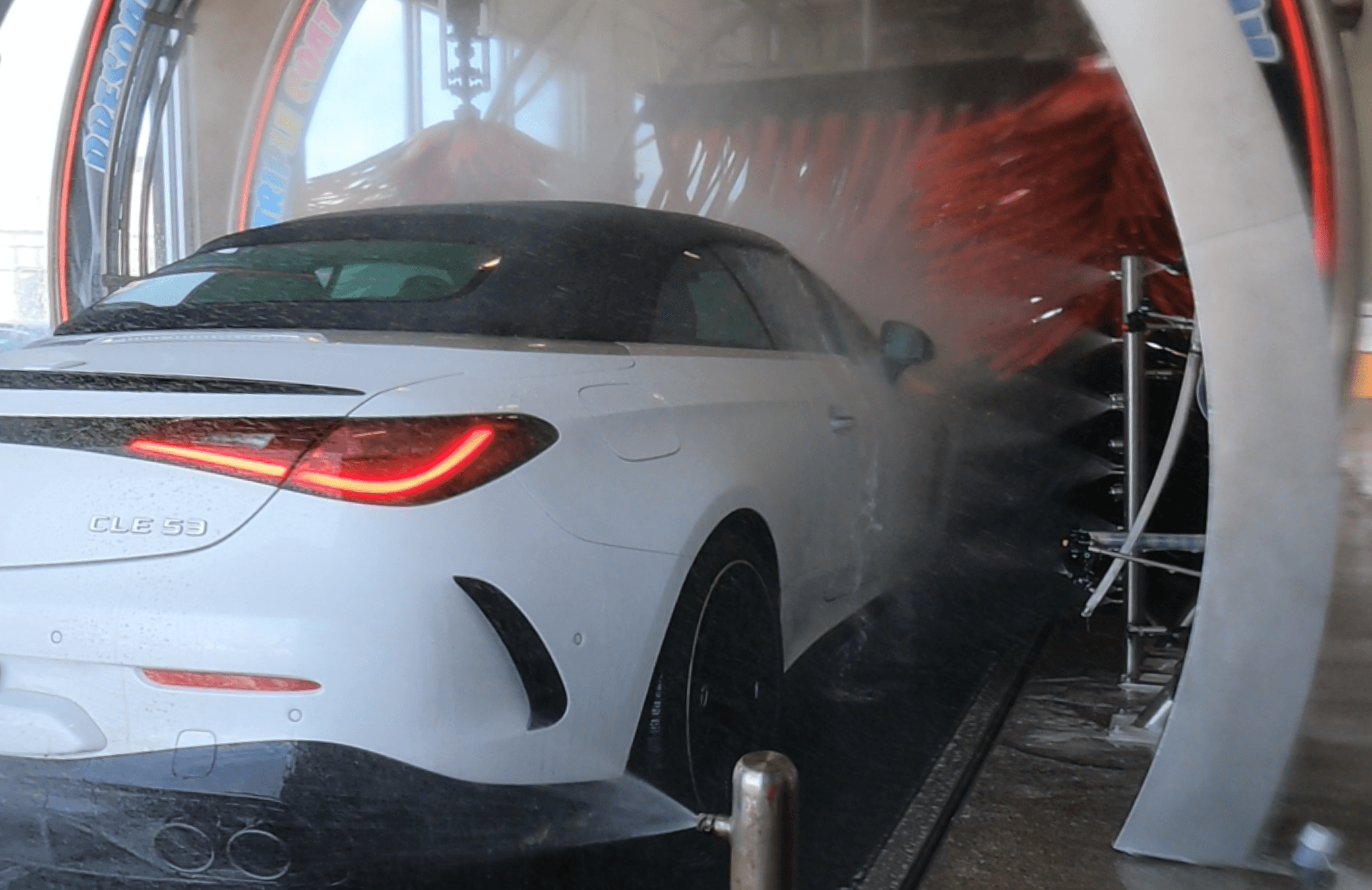 Car entering wash tunnel